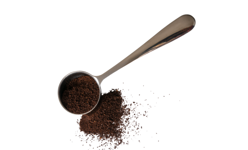 Coffee grounds with spoon